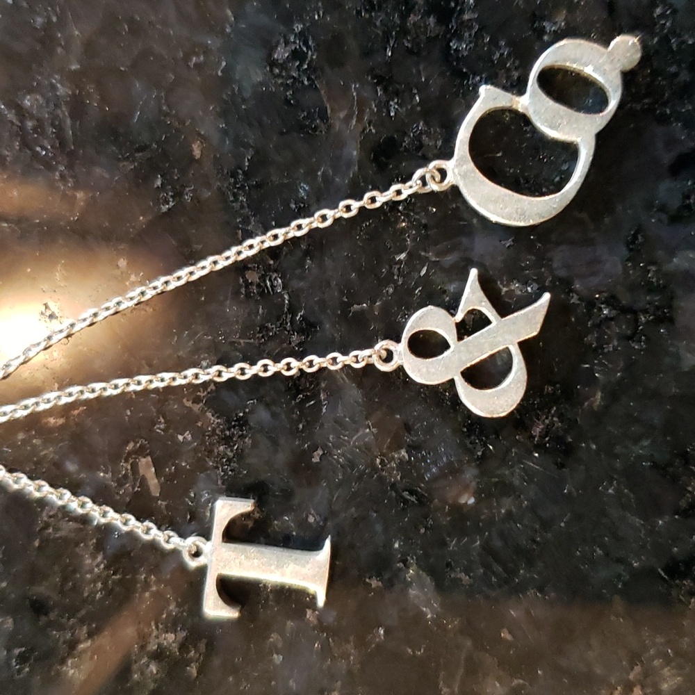 Tiffany & Co. Tiffany & Co 16 in Dangling Necklace..Sterling Silver